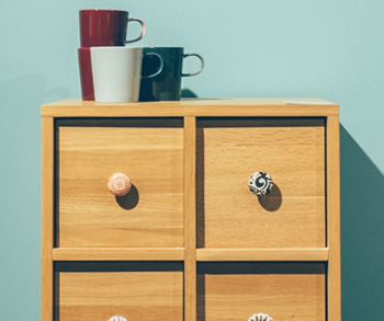 dresser with coffee cups